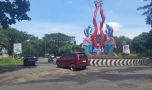 Foto-fis-Sat-Lantas-Polres-Minut-usai-memperbaiki-jalan-rusak